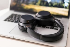 why do podcasters wear headphones